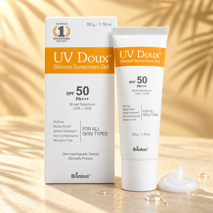 UV Doux Silicone Sunscreen Gel SPF 50 PA+++ 50g tube and box with white gel swirl and water droplets in warm summer sunlight